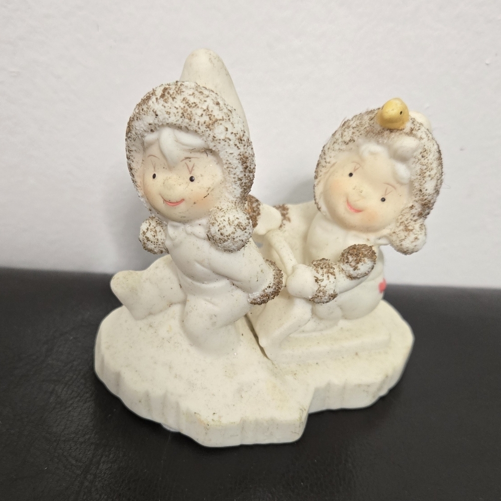 Wellington Collection Porcelain Figurine Hitching a Ride On Sled 3" Tall Figure
